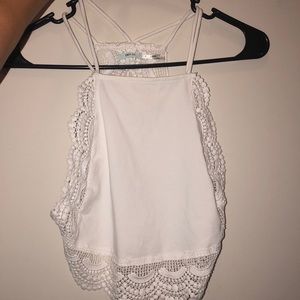 UO crop top with open back and lace trim. NWOT